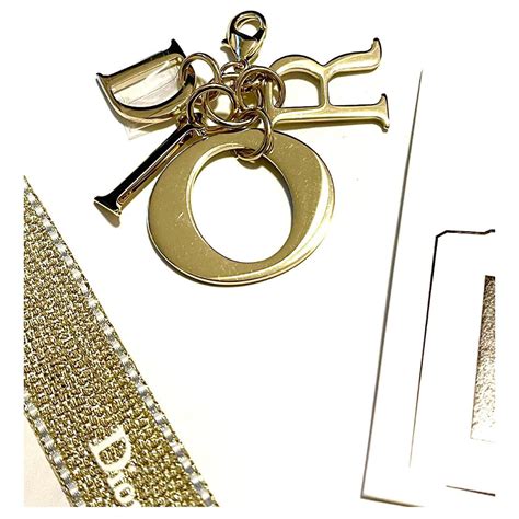 christian dior bag charm|christian dior brooches.